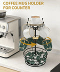 Dope 360 Degree Rotating Mug Holder Tree With Ten Hooks, three-tier coffee rack with mugs on a kitchen countertop.