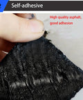Close-up of Straight Up Tough Heavy Duty Self Adhesive Roofing Tape showing its asphalt backing, ideal for repairs.