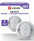 Smoke And Carbon Monoxide Detector With 10-Year Battery Model 30CUD10 1 Pack 2-In-1 Detection With Faster Smoke Sensing Red LED Alert For Clear Visual Cues In Home Safety. front view of two white Kidde alarms