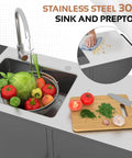 Outdoor Kitchen Sink With Hose Hookup And Stainless Steel Prep Table with vegetables and cutting board, ideal for outdoor use.