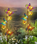 Solar Butterfly Garden Lights 2 Pack Outdoor Stake Decor With Waterproof Metal Butterflies And Flowers, LED string lights glowing.