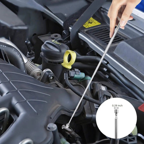 Person using Telescoping Magnetic Pick Up Tool With 1 lb And 15 lb Pickup Rod under car hood to retrieve metal object