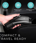 Person holding a black NACS To J1772 EV Charging Adapter For Tesla And All J1772 EVs, 80A 240V, UL 2252 Certified