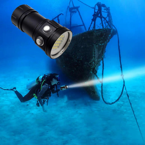 Scuba diver using Beast Mode Bright 18000 Lumen Diving Flashlight Waterproof To 100 Meters LED Submersible Torch near shipwreck