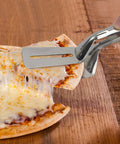 Multifunction 11 Inch Premium Stainless Steel Tongs 3 In 1 Gripper Flip And Scraper lifting pizza slice on wooden board