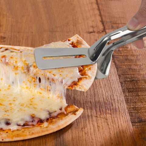 Multifunction 11 Inch Premium Stainless Steel Tongs 3 In 1 Gripper Flip And Scraper lifting pizza slice on wooden board