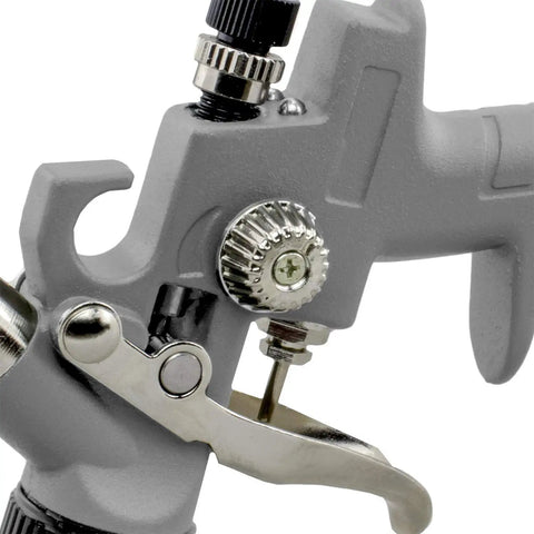 Close-up of Handy Mini Hvlp Gravity Feed Spray Paint Gun With Zero Point Eight Mm Needle Tip and Sixteen Ounce Mixing Cup controls.