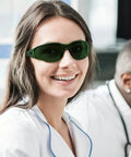 Smiling woman wearing Heavy Duty Laser Safety Glasses Beast Mode OD4 Eye Protection blocking UV and green lasers.