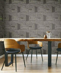 Dining room with Nikki Chu Black And White Zulu Signature Peel And Stick Wallpaper Roll for accent walls, featuring bold modern pattern.