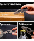 Dope Everyday Carry Multi Tool Keychain With Pry Bar Bottle Opener And Wrench For Men Outdoor Survival Gear in use opening box, can, and bottle