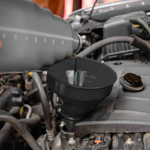 Hand pouring oil into engine using Five Piece Auto Oil Funnel Set With Flexible Neck And Filter Screen For Gas Oil Coolant And Engine Oil