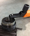 External And Internal Adjustable Thread Restorers Universal Thread Repair Tool Kit in use on metal surface.