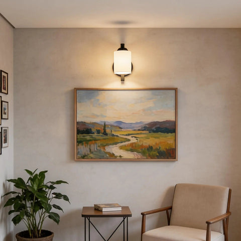 Top Tier Modern Farmhouse Wall Sconces With Solid Matte Black Frame And Soft Diffused Glass Shade Hardwired Vanity Light Fixture above a painting.