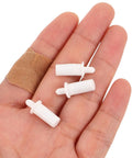 White Shutter Repair Pins, 120 Piece Movable Louver Fasteners in hand, showcasing plastic durability and compact size for easy use.
