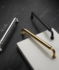 Hollywood Hills 4486 Cabinet Pull 6 Inch Center to Center Solid Brass Hardware, gold finish on marble background