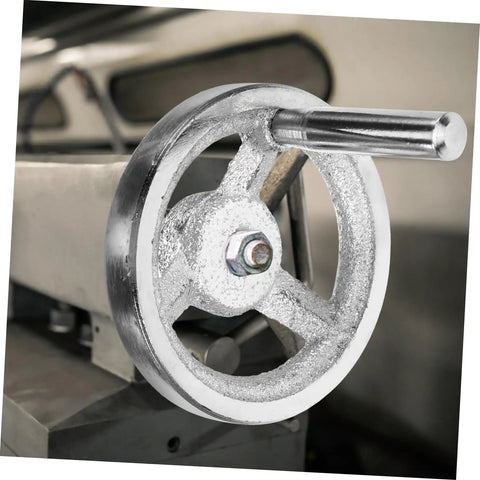 Heavy Duty Cast Iron Handwheel With Chrome Plated Crank Handle for Lathe and Milling Machines, close-up view on machinery