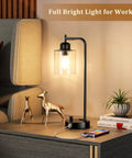 Bedside Table Lamp With USB C Charging Port And Outlets Fully Stepless Dimmable Black Desk Lamp With Glass Shade on nightstand.
