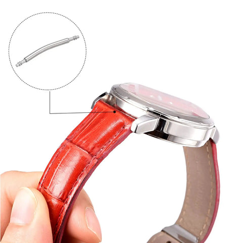 Close-up of a watch with a red leather strap showing installed 19mm Curved Spring Bar Pins 1.5mm Diameter Stainless Steel Double Flanged End.
