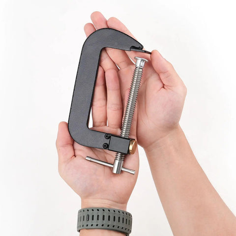Beefy Fast Release 4 Inch G Clamp For Workshop Projects, Steel With Anti Rust Finish, Quick Slide Jaw For Easy Adjustments, Trapezoidal Thread For Strong Holding Power, Heavy Duty Woodworking And Metalworking Clamp held in hands