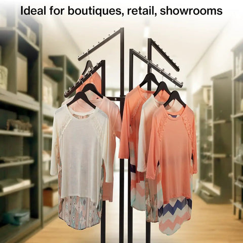 Black 4 Way Adjustable Clothing Rack With Slanted Arms holding dresses in retail display, adjustable height, 32x32 inch base