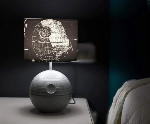 Death Star 3D Touch Lamp USB LED Desk Light With Printed Death Star Shade on bedside table, 14 inch tall, touch activated night light.