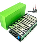 Slam Dunk 48V DIY Battery Case Kit With 30A BMS Guard, green weatherproof case and nickel strips for electric scooter upgrades.