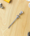 Pinball Shooter Rod Replacement Part Metal Spring Loaded Ball Launcher for Tabletop Arcade Machines with Precision Fit Silver Finish Beefed Up for Parties and Home Game Nights A Smooth Accurate Play Upgrade silver spring-loaded metal rod on wood