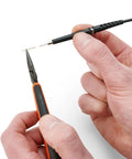 Handsfree Oscilloscope Probe SQ100 100MHz with spring-loaded needle demonstrating PCB contact for precise measurement