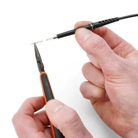 Handsfree Oscilloscope Probe SQ100 100MHz with spring-loaded needle demonstrating PCB contact for precise measurement