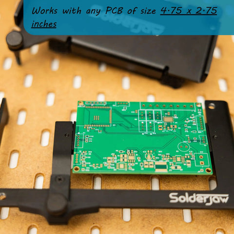 Hands Free Through-Hole Soldering Jig For PCBs And Breadboards CSJ-1 holding a green PCB on a perforated surface, size 4.75 x 2.75 inches