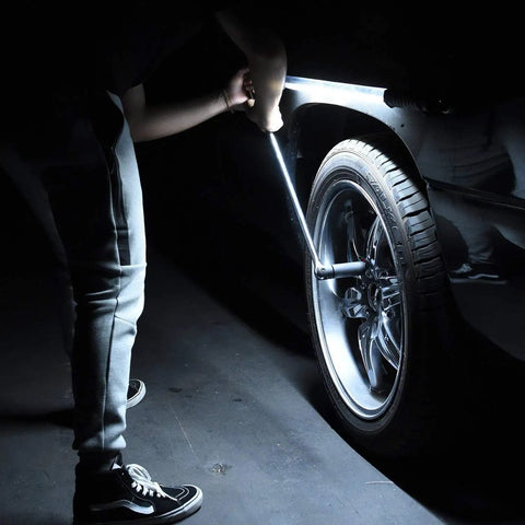 Mechanic using Cordless Underhood Work Light For Mechanics, Rechargeable Li-Ion LED Light Bar With 202 SMD LEDs, Up To 1200 Lumens