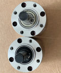 Top view of two Kickass 42mm Planetary Reducer Gearbox components with mounting holes for DC worm motor applications.