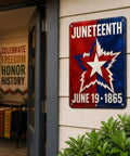 Juneteenth metal sign with star design, June 19, 1865 text on wall, celebration theme decor