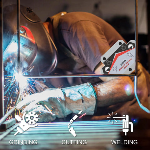 Welder using heavy duty welding magnets for precise angle positioning in metal fabrication with sparks. Arrow-shaped magnet visible.