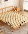 Heavy Duty 4 Pack Mattress Retainer Bars Lock Down Your Bed Frame With Tough Metal Slide Stoppers Non Slip Bed Grippers That Hold Tight And Keep Your Mattress Square So You Can Sleep Easy Tonight placed on a wooden bed frame.