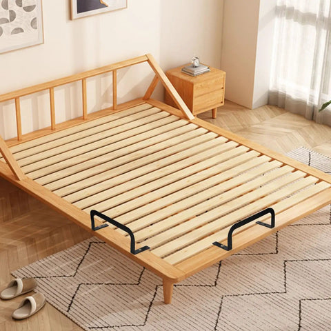 Heavy Duty 4 Pack Mattress Retainer Bars Lock Down Your Bed Frame With Tough Metal Slide Stoppers Non Slip Bed Grippers That Hold Tight And Keep Your Mattress Square So You Can Sleep Easy Tonight placed on a wooden bed frame.
