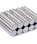 100 Pack Neodymium Disc Magnets Featuring Kickin Strong Rare Earth Pull Smooth Slick Electroplated Finish Heavy Duty Grip for DIY setups.