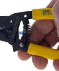 Hella Versatile Data T Cutter Wire Tool For Structured Networks And Coax Cables Up To Rg 11 super lightweight with yellow handles and wire being cut.