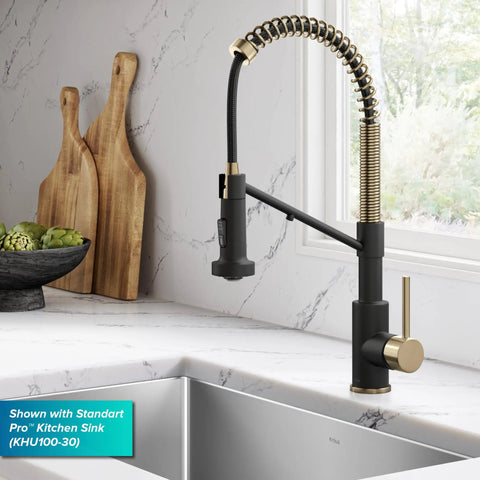 KRAUS Bolden 2-in-1 Pull Down Kitchen Faucet with Integrated Water Filter Tap for Reverse Osmosis or Water Filtration System in Spot-Free Antique Champagne Bronze/Matte Black, KFF-1610SFACBMB, showcased with kitchen sink and wooden cutting boards.