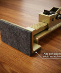 Close-up of Pro Grade Flooring Jack For Hardwood Installations With Ratcheting Alignment Tool showing soft pad for protection.