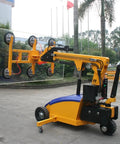 Heavy Duty Electric Vacuum Glass Lifter Robot Featuring Hydraulic Arm And Killer Suction Cups for lifting large glass safely.