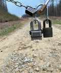 Heavy Duty Multi User Padlock Holder Provides Solid Gate Or Door Security Supports Four Independent Keys on a chain with locks.