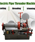 Tough As Nails 110V Electric Pipe Threader Machine For 1/2 To 3 Inch Plumbing Pipes with red handles and control panel.