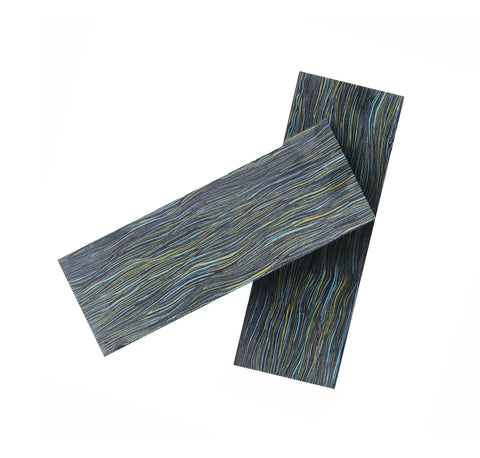 Textured black and yellow slabs overlapping with streak patterns