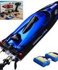 Beast 14 Inch RC Boat For Lakes And Pools With Dual 1100mAh Batteries, Speeds Up To 25 Kph, shown in blue with batteries