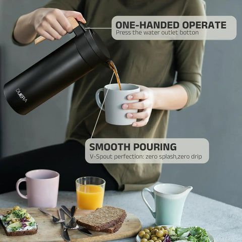 Person pouring coffee from Double Walled Stainless Steel Thermal Coffee Carafe 51 Oz Keeps Your Drinks Hot Or Cold For Hours, 1.5 L Beverage Dispenser With BPA Free Lid, Home Office Party Fresh Brew On Demand, Black into cup