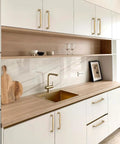 Champagne Bronze Cabinet Pulls 5 Inch 128mm 10 Pack for Kitchen Cabinets and Drawers installed on white kitchen cabinetry