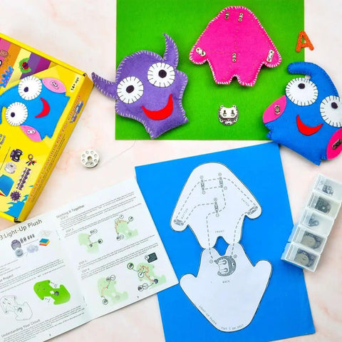 LilyPad Sewable Electronics Starter Kit For Arduino Learning E Textiles with cuttable templates and colorful plush designs.