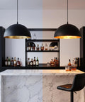 15" Black and Gold Dome Pendant Lights, 3 Pack Industrial Farmhouse Textured Matte Black Hanging Light Fixtures with Hand-Applied Gold Leaf Interior for Kitchen Island, Dining Room, Bar, E26 over a marble bar.