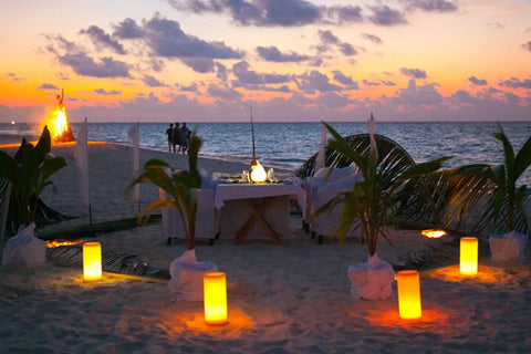 Beach dinner setup with Flameless LED Pillar Candles With Hemp Rope And Remote Timer Real Wax Battery Operated Candles